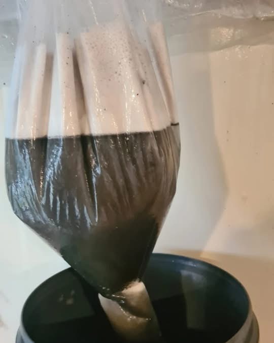 Dirty water collected during heat pump cleaning